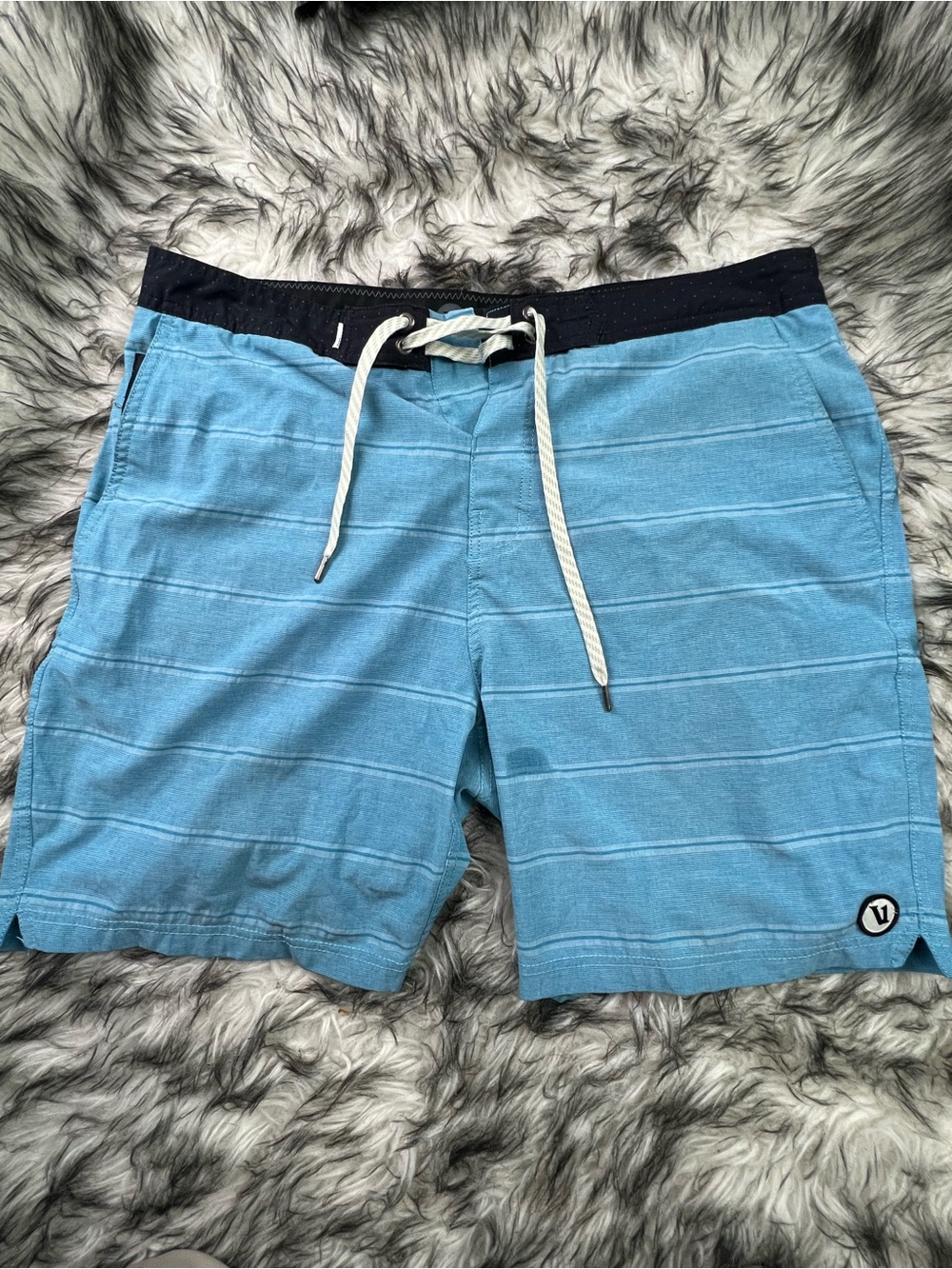 Vuori Men’s Light Blue Striped Swim Trunks